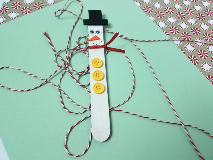 snowman magnets made with crafts sticks