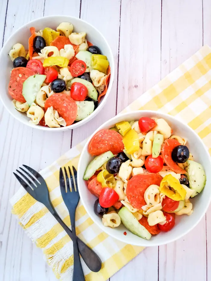 This delicious summer tortellini salad is a perfect side dish to go with your grilled foods. It's a favorite at pot lucks and is super easy to make!