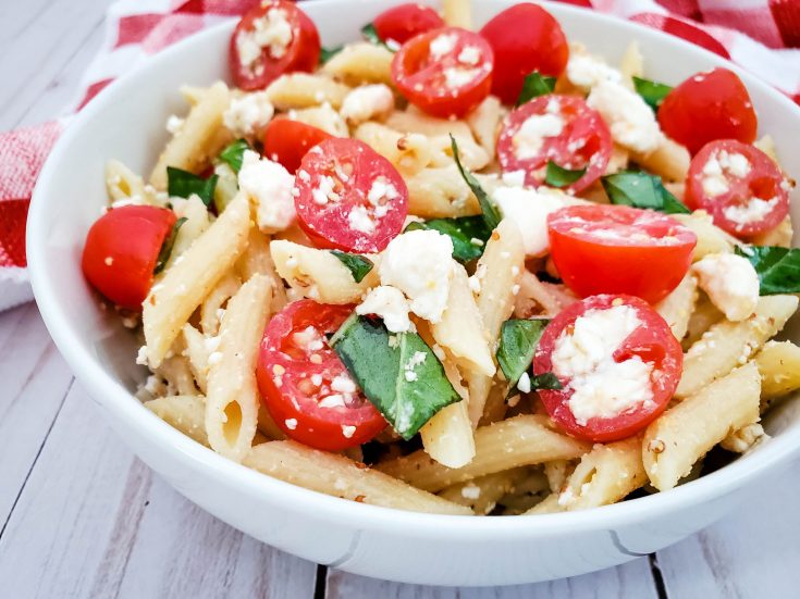 This tomato feta pasta salad is a delicious summer salad recipe, and super easy to make for a side dish or pot luck.