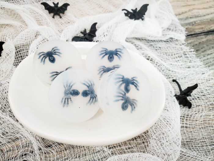 Easy DIY Soap with spiders on mesh